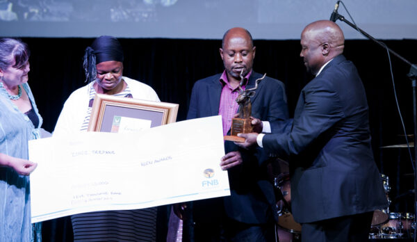 Best customer service award winner, Zondi Seapane, KNP presented