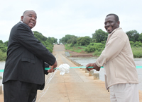 Councillor Mavuso and Mr Sibiya officially cut the ribbon to open the new Crocodile Bridge